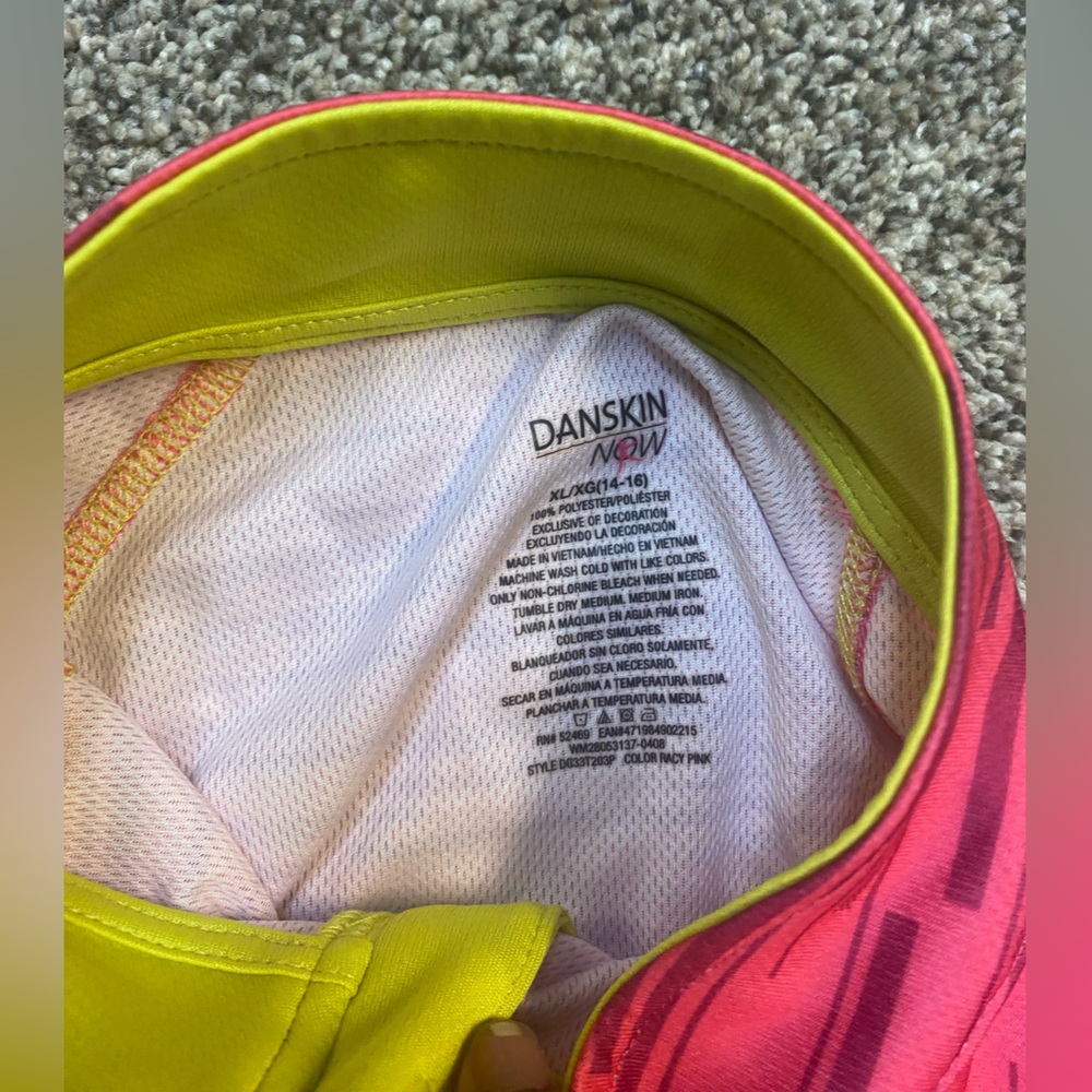 Pink striped active, wear pull over mesh on the inside made with 100% polyester